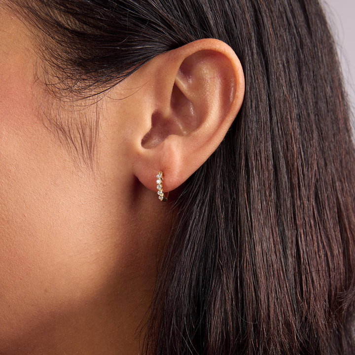 Shared Prong Diamond Huggie Hoop Earrings In Yellow Gold 14K
