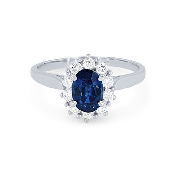 Oval Sapphire and Diamond Halo Ring In White Gold 14K