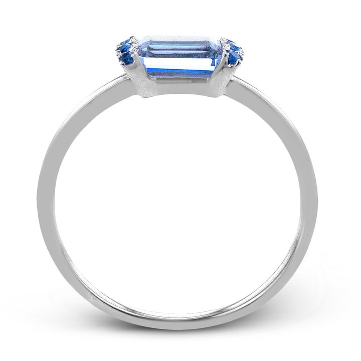 Emerald Cut Blue Topaz Ring In Solid 14K White Gold