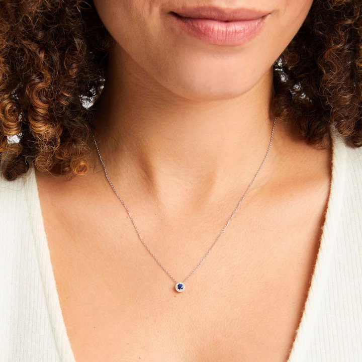 Blue Sapphire And Diamond Halo Pendant Necklace In White Gold 14K