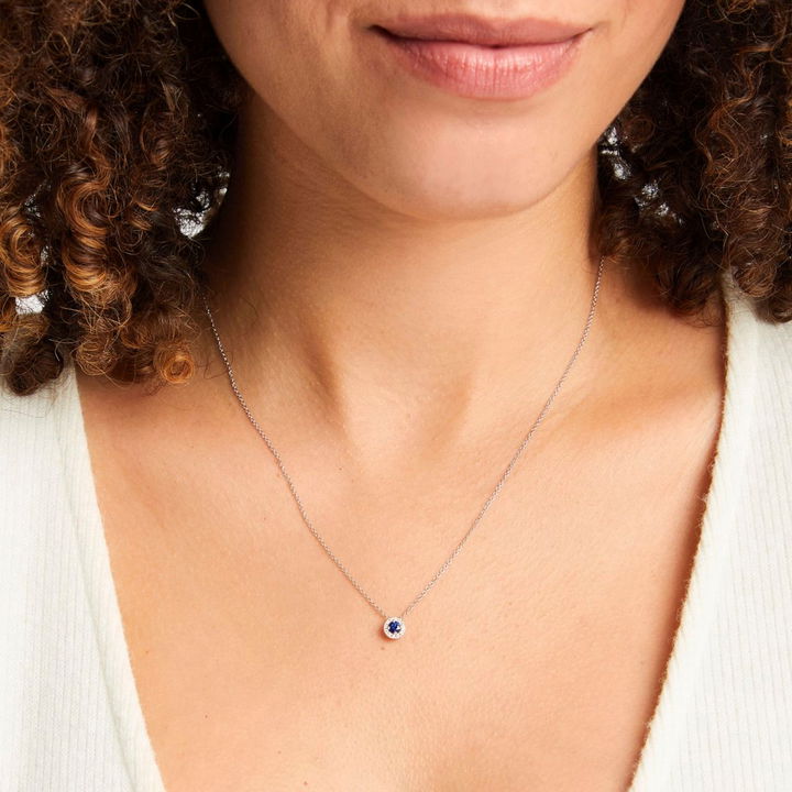Blue Sapphire And Diamond Halo Pendant Necklace In White Gold 14K