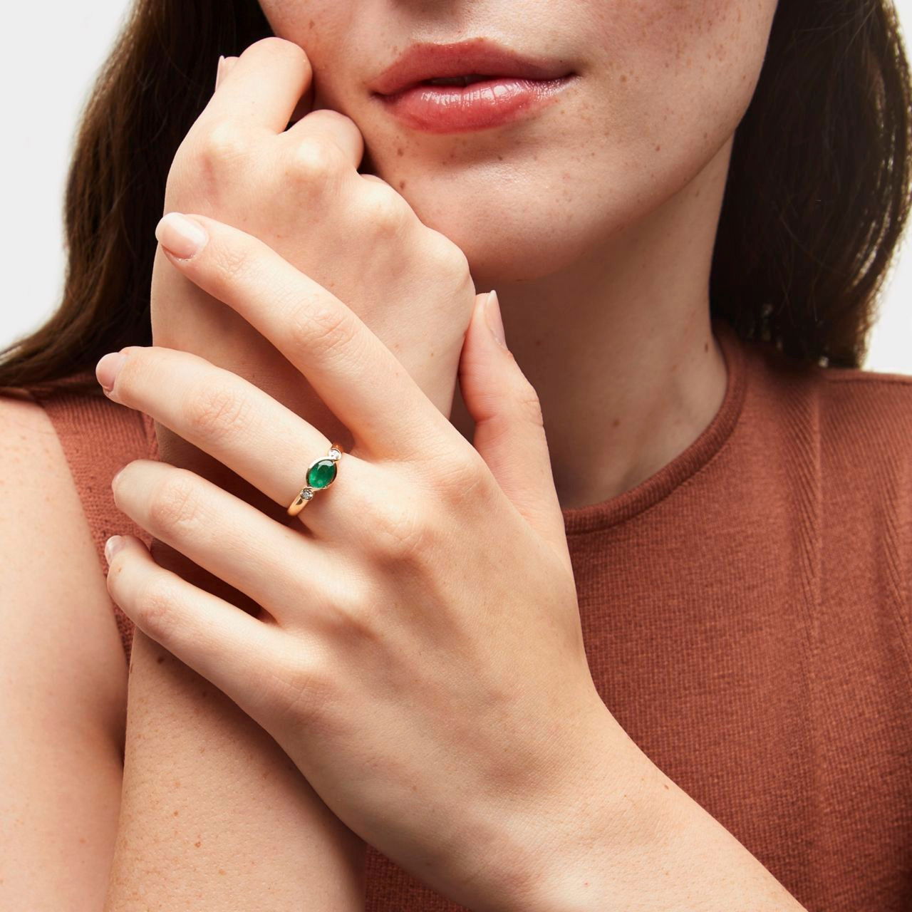 Oval Emerald Bezel Diamond Ring