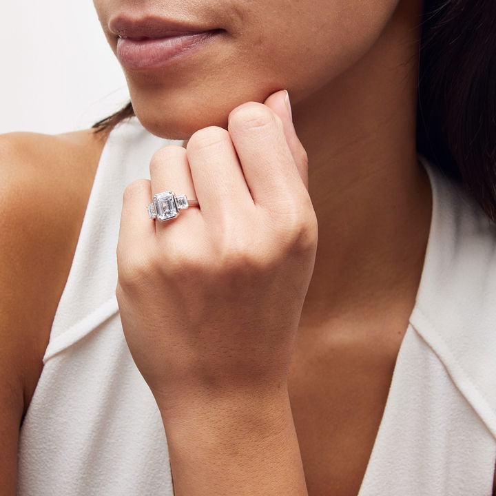 White Gold 18K Uneek Emerald Side Stone Under Halo Engagement Setting