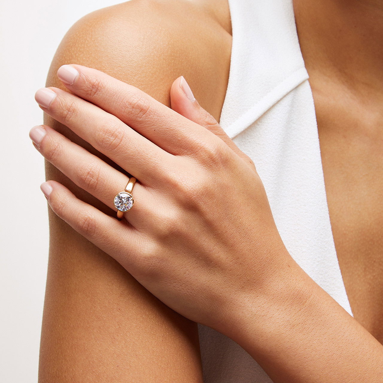 Uneek Round Diamond Under Halo Engagement Setting 1
