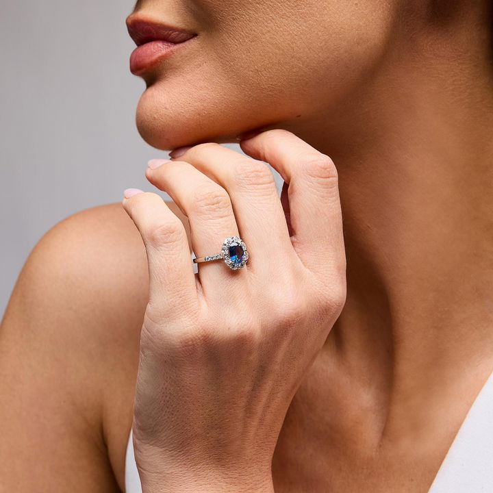 Oval Blue Sapphire Diamond Halo Ring