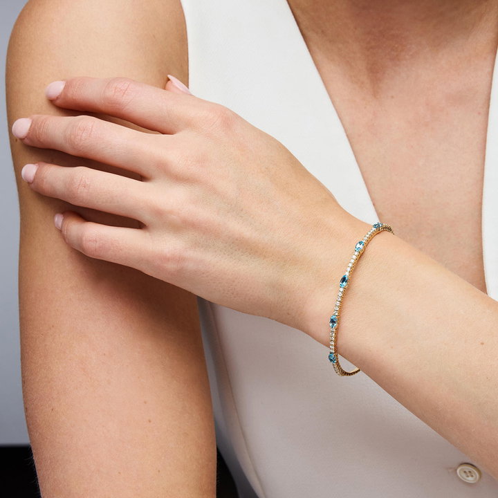 Diamond and Swiss Blue Topaz Flexible Bangle Bracelet In Yellow Gold 14K