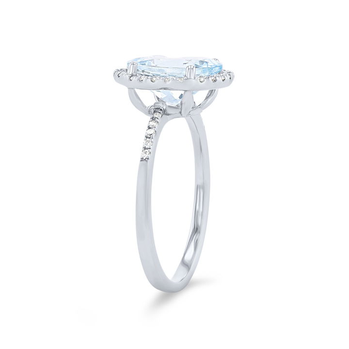 Oval Aquamarine and Diamond Halo Ring In White Gold 14K