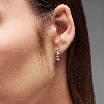 Graduating Diamond Huggie Earrings In White Gold 14K
