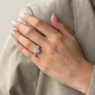 Pear Diamond Halo Petite Twist Engagement Ring In White Gold 14K