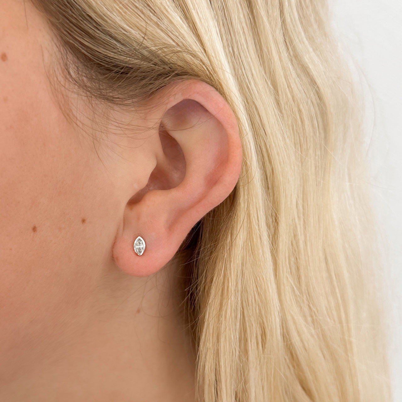 White Gold Marquise Diamond Bezel Stud Earrings