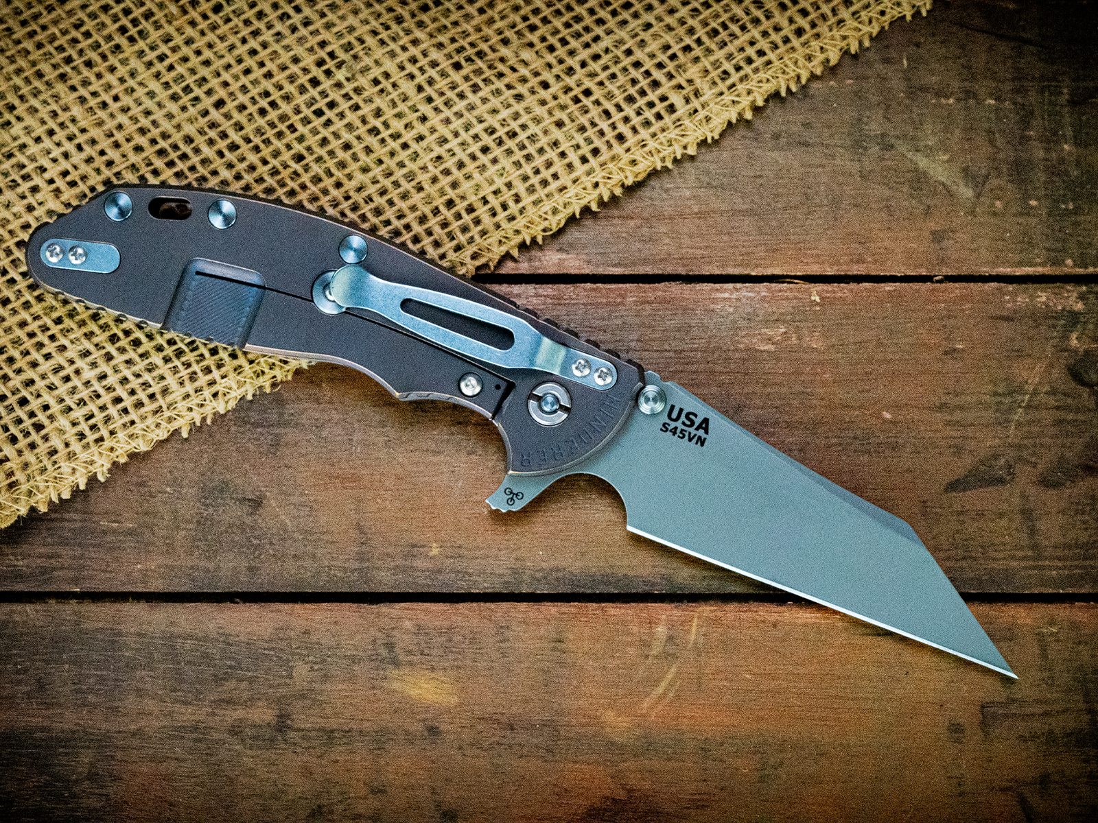 XM-24 Wharncliffe Skinny-S45VN-Purple/Bronze-Translucent Green G10-Light Blue Ti Hardware XM-24 Wharncliffe Skinny-S45VN-Purple/Bronze-Translucent Green G10-Light Blue Ti Hardware
