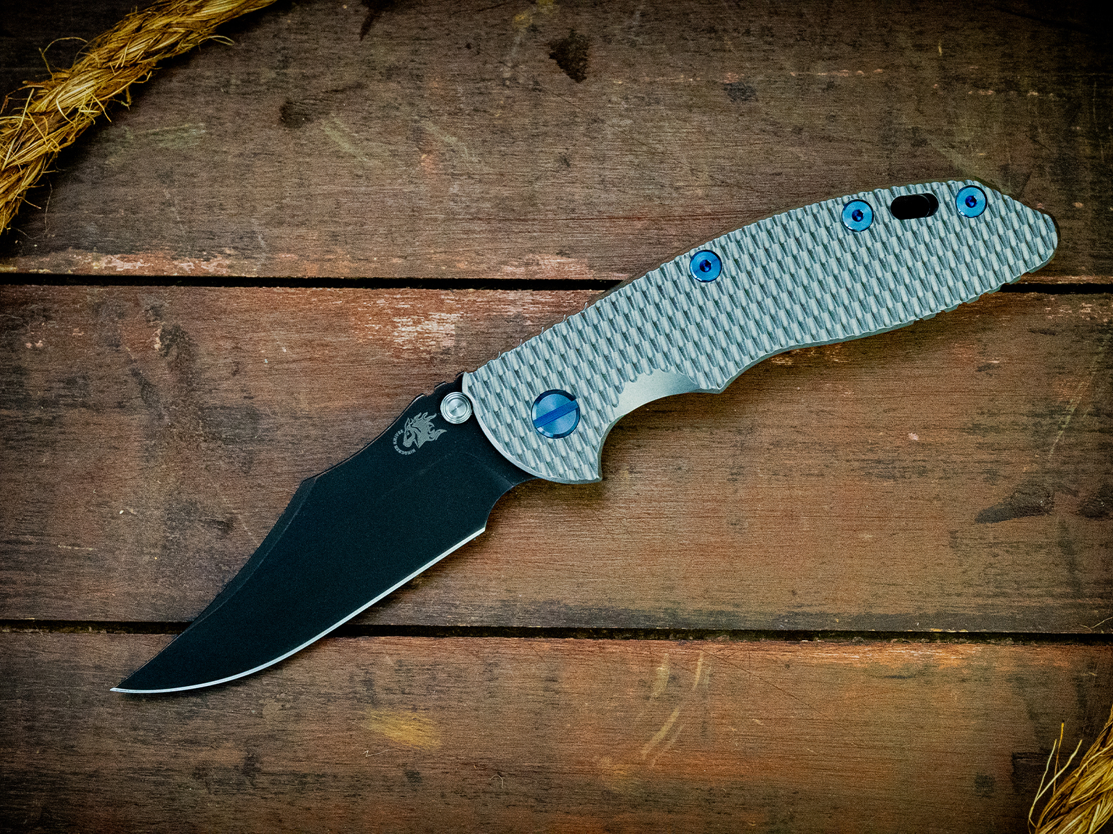 XM-18 3.5"-Non Flipper-Bowie-Battle Black Blade-Full Textured Stonewash Titanium-Blue Ti Hardware XM-18 3.5"-Non Flipper-Bowie-Battle Black Blade-Full Textured Stonewash Titanium-Blue Ti Hardware