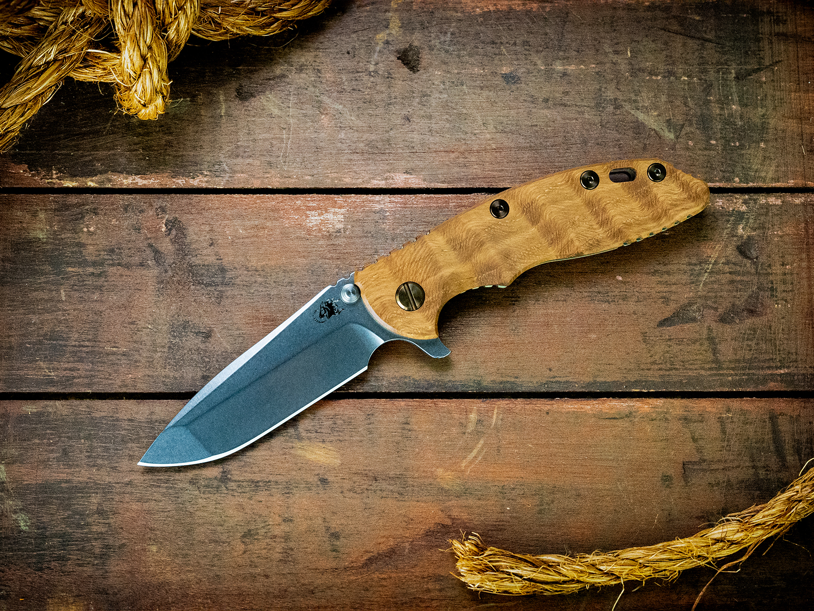 ExpProductCell_XM-18 3.5" Spanto-S45VN-Stonewash Gold-Curly White Oak-Bronze Ti/Orange Alum Hardware