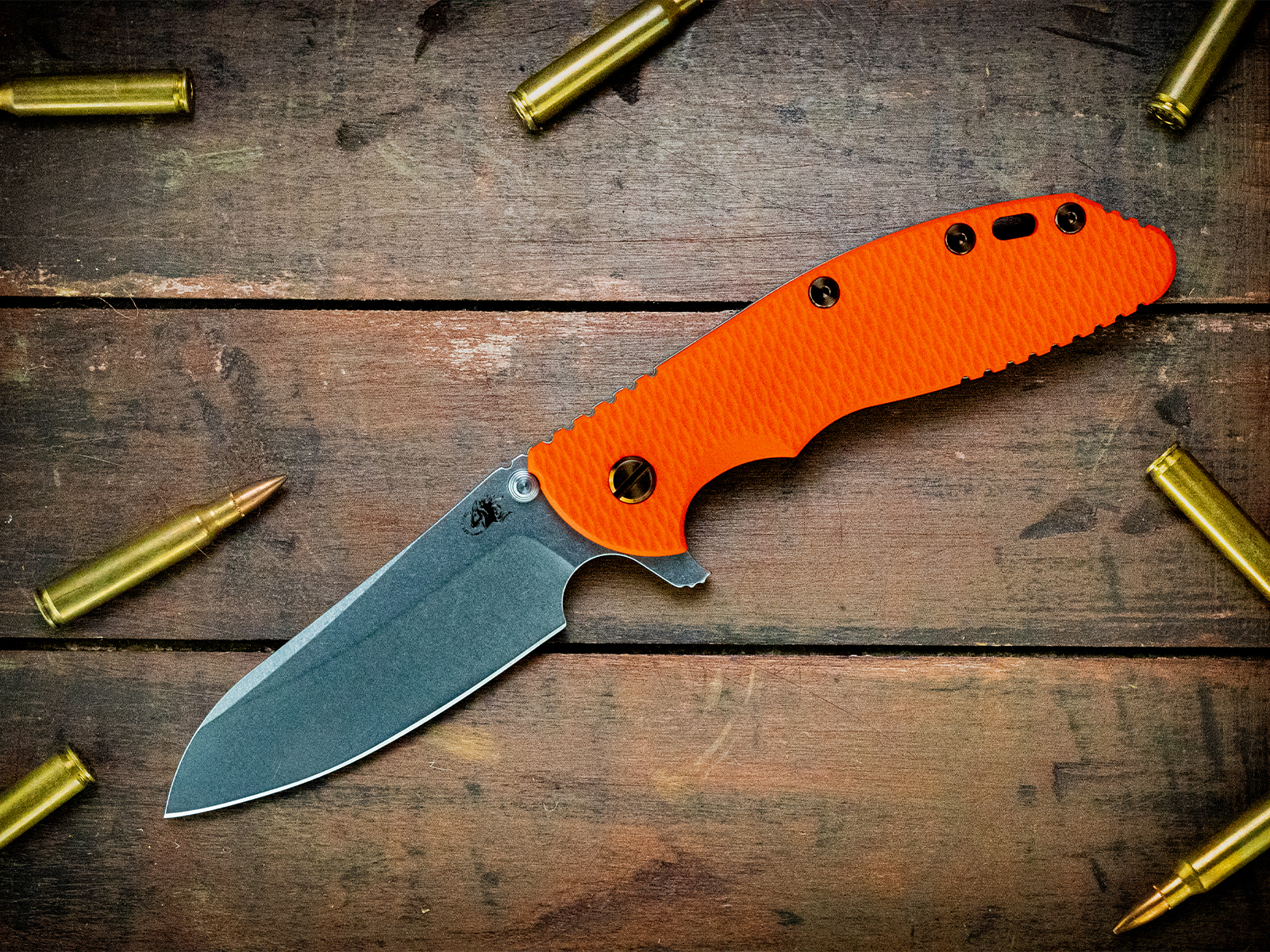 XM-24 Sheepsfoot-CPM20CV-Stonewash Blade-Textured Battle Green-Orange G10-Bronze Ti Hardware XM-24 Sheepsfoot-CPM20CV-Stonewash Blade-Textured Battle Green-Orange G10-Bronze Ti Hardware