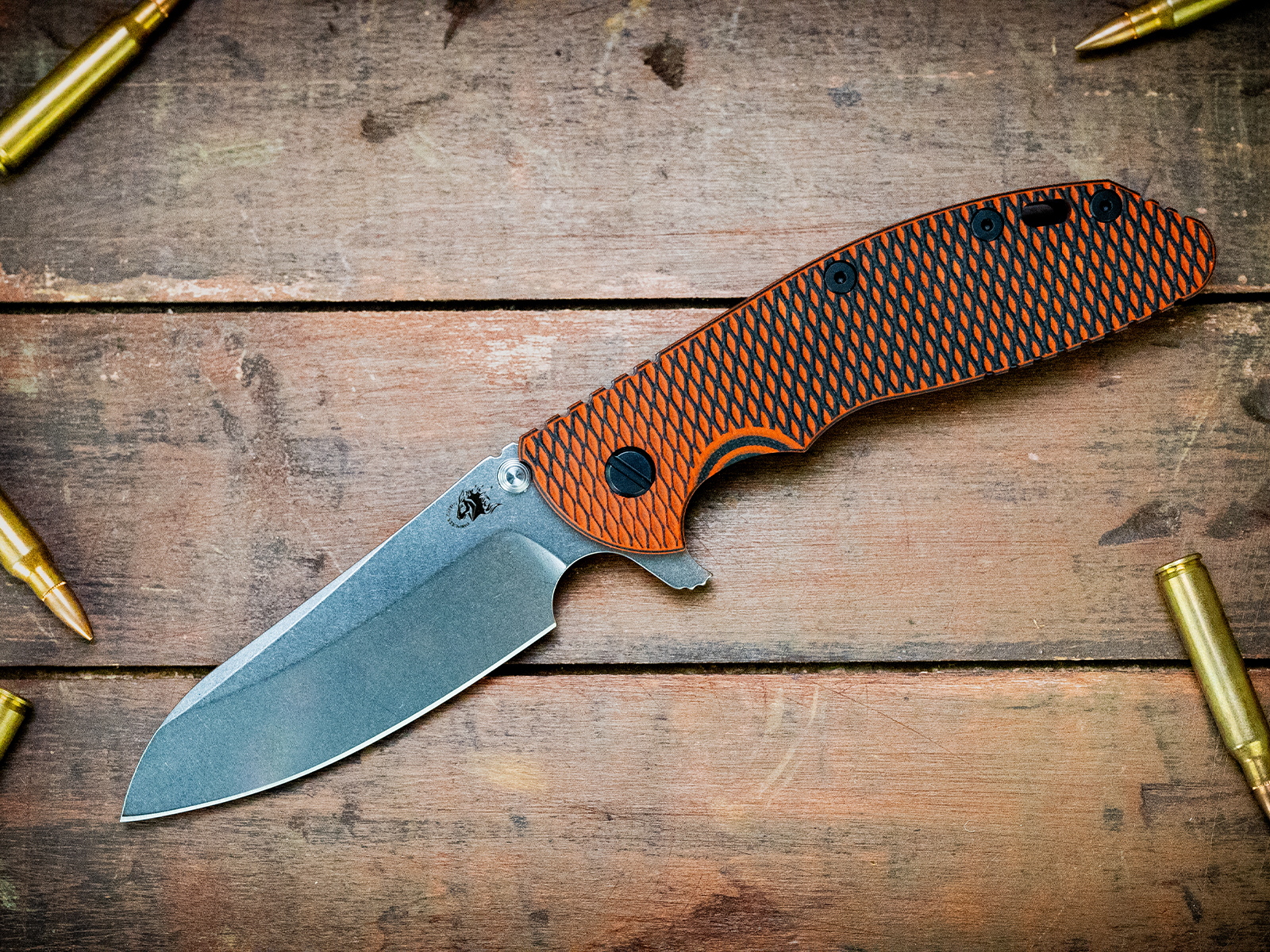XM-24 Sheepsfoot-CPM20CV-Stonewash Blade-Battle Purple-Orange/Black G10-Black Nitride/Orange Standoffs XM-24 Sheepsfoot-CPM20CV-Stonewash Blade-Battle Purple-Orange/Black G10-Black Nitride/Orange Standoffs