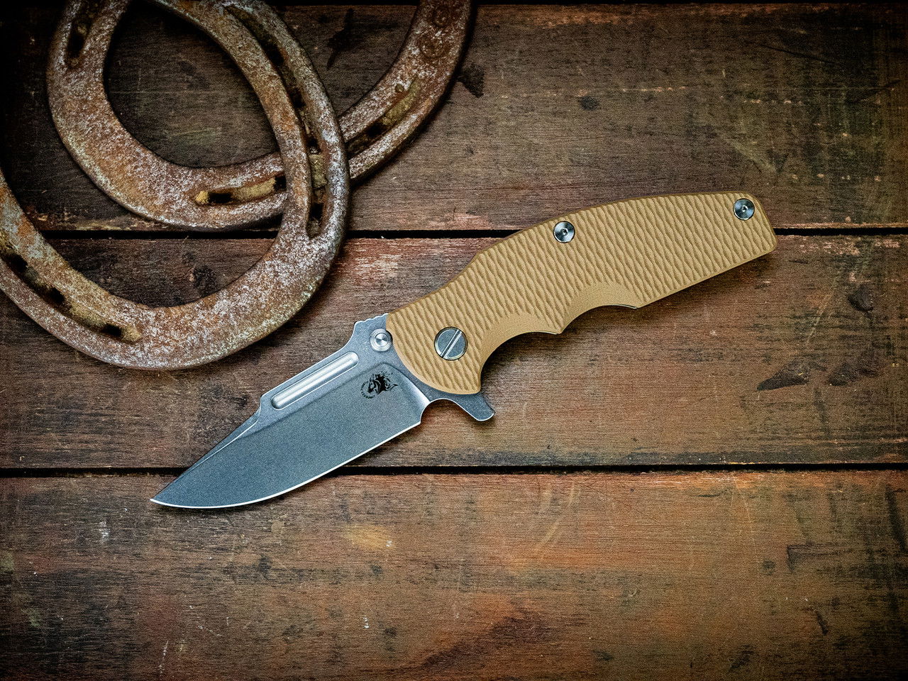 Jurassic-Frontier Clip Point-Magnacut-Stonewash Blue-G10
