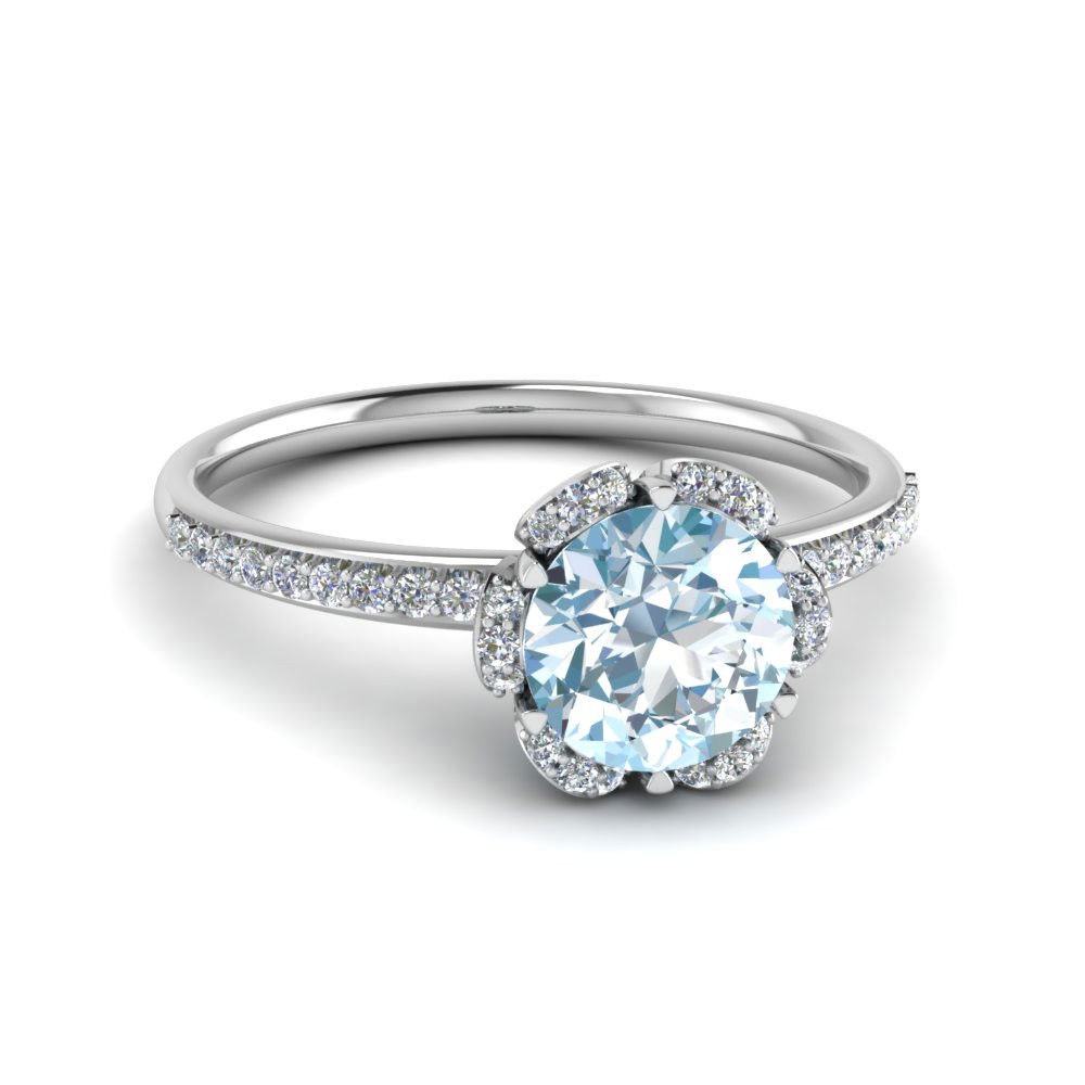 Engagement ring with on sale aquamarine side stones