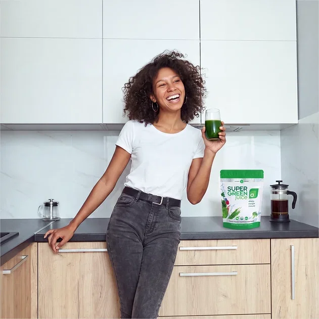 Woman with Super Green Juice Woman with Super Green Juice